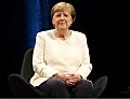 Как Меркель отдувалась за войну в Украине и беженцев